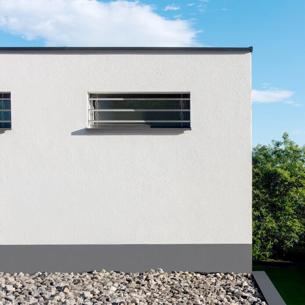 Grille de défense 1050 x 450 mm sur façade